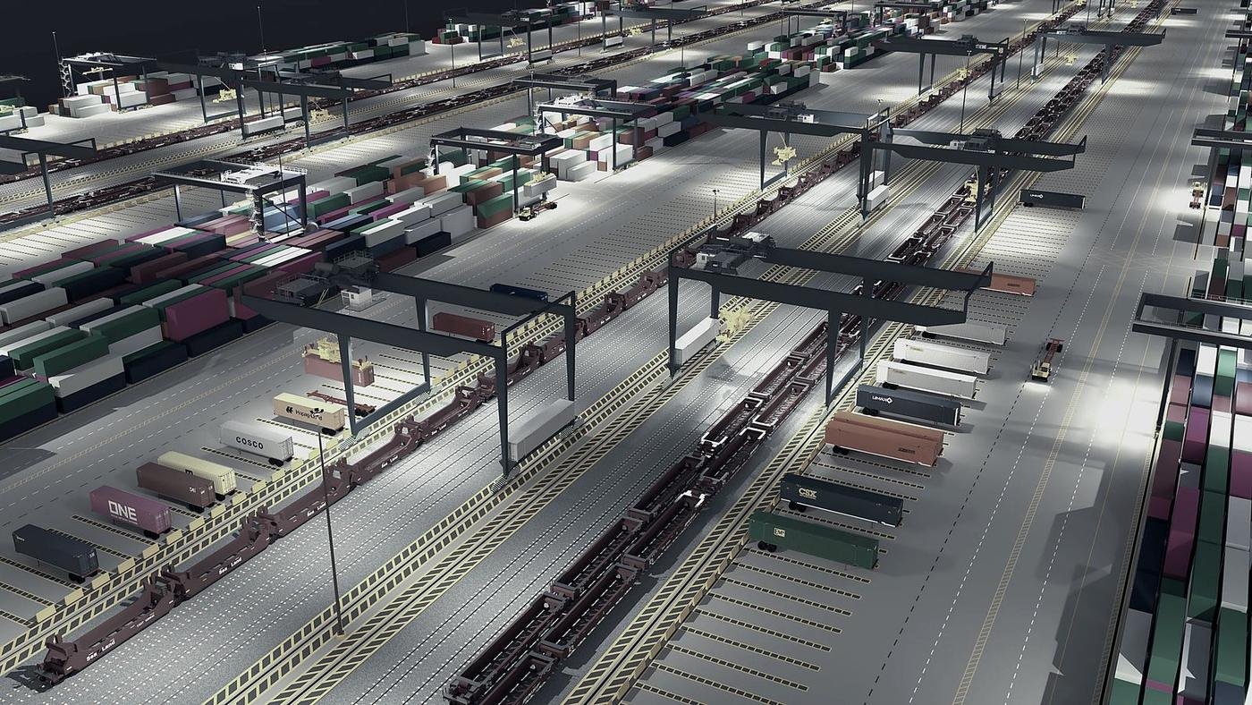 Overhead view of a large freight sortation facility with conveyor lines running in every direction.